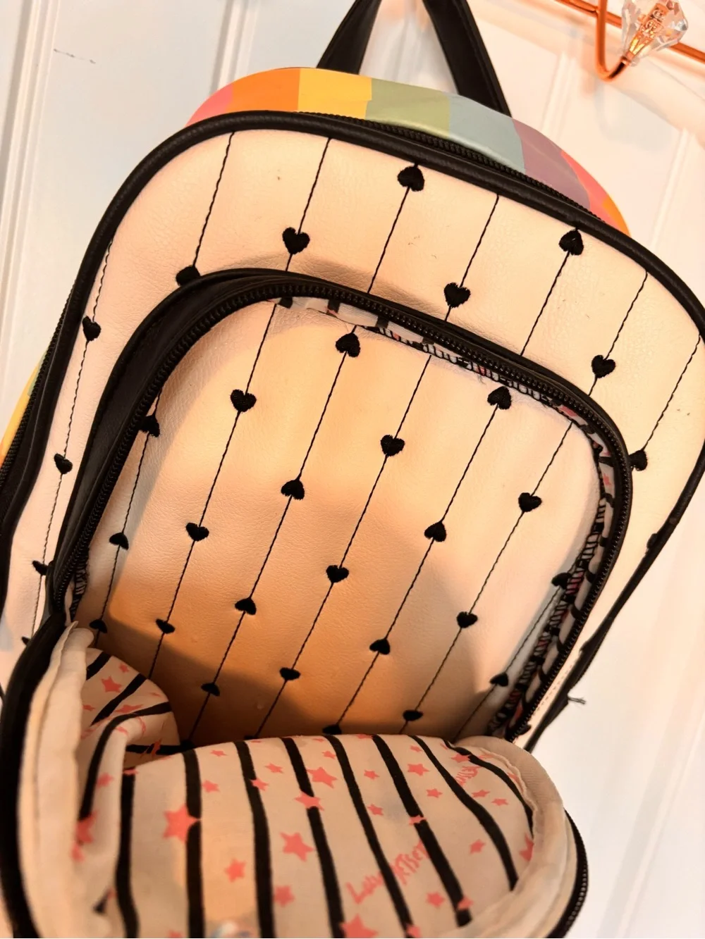 Cream & Black Heart-Print Mini Backpack with Pastel Stripe Side